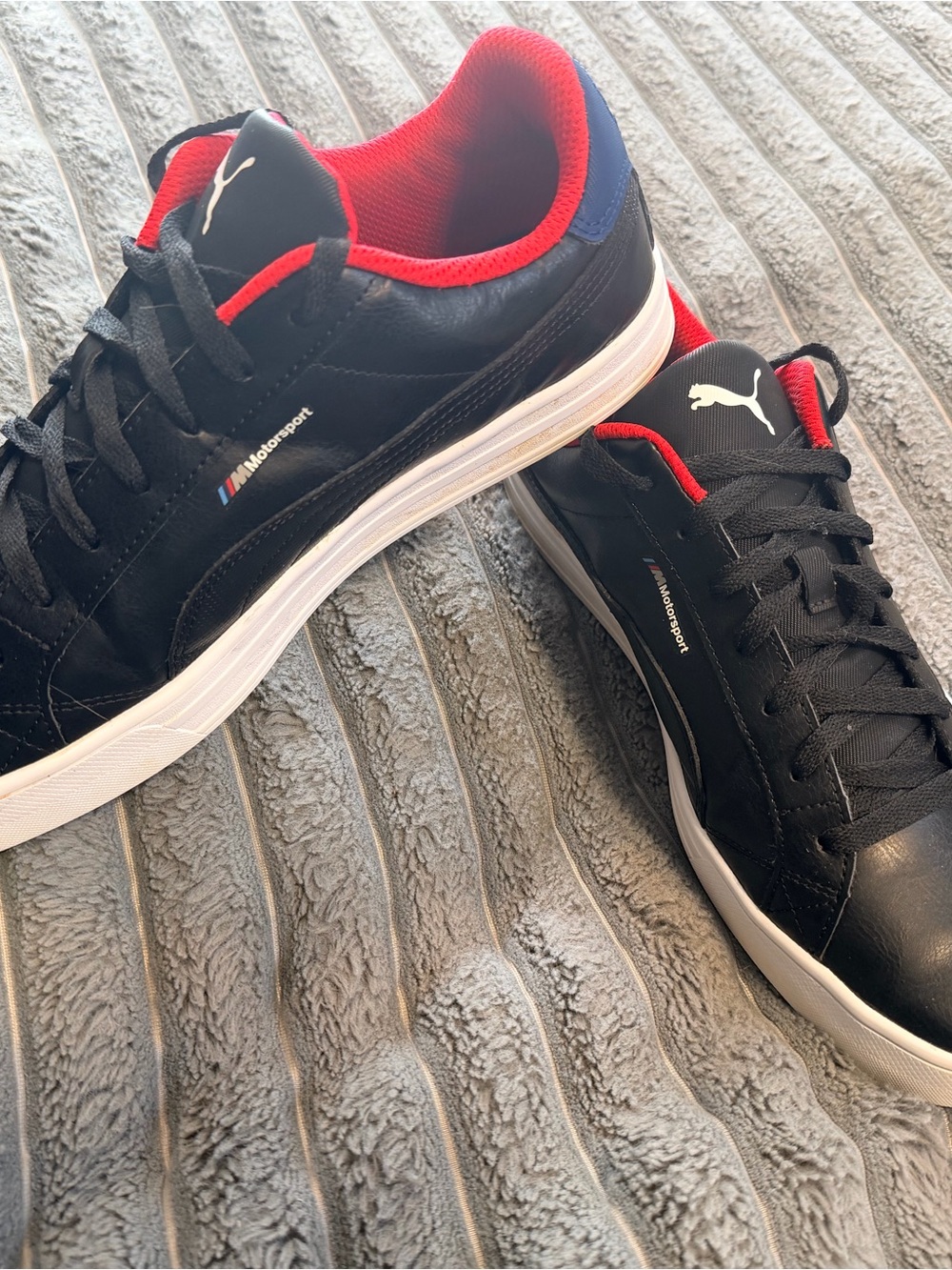 Puma Black Sneakers with Red & Blue Accents